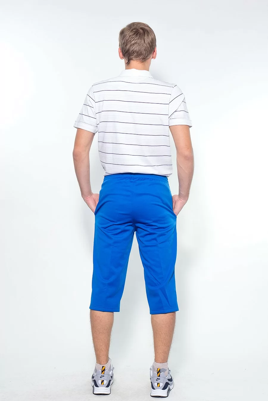 Брюки тренировочные Asics 3/4 Pant яр.синие T222Z9/0043 Фото Брюки тренировочные Asics 3/4 Pant яр.синие T222Z9/0043 со склада магазина Спортев