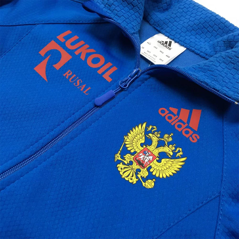 Костюм разминочный синий/оранжевый Фото Костюм разминочный синий/оранжевый со склада магазина Спортев